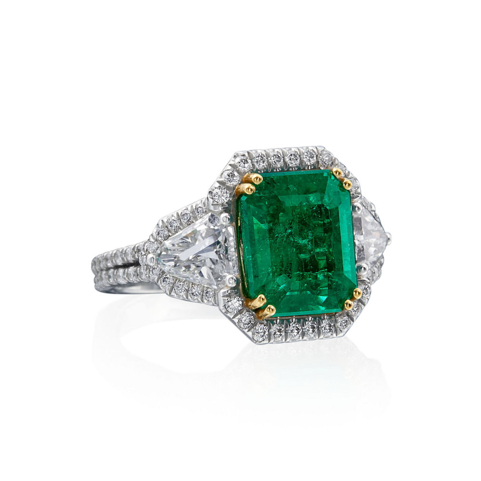 Platinum and Emerald Three Stone Ring