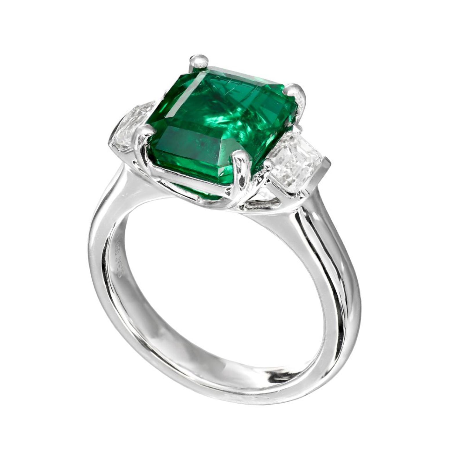 Platinum Emerald and Diamond Three Stone Ring